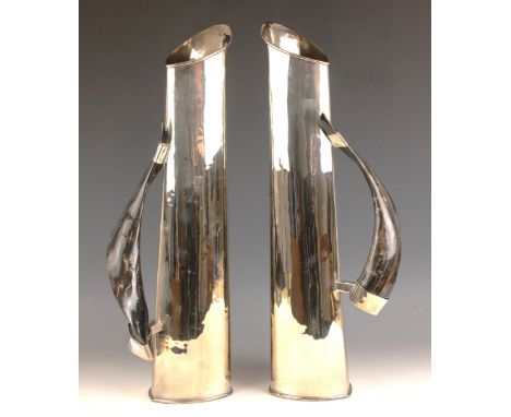 A pair of Argentinian silver plated and horn mounted ewers, in the manner of Anthony Redmill, Plata Lappas, the shaped triang