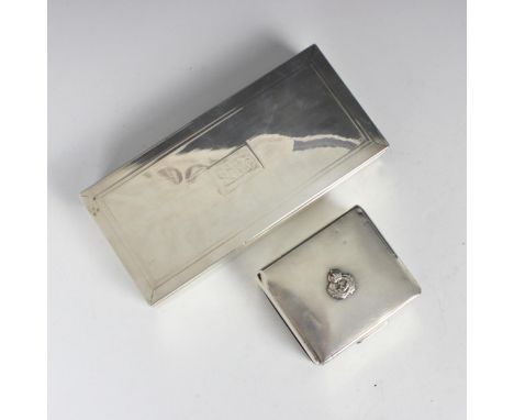 A George VI silver cigarette box, Adie Brothers Ltd, Birmingham 1939, the square hinged cover with Royal Navy emblem, engrave