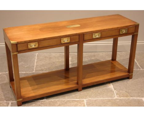 A campaign style cherry wood console table, by Kennedy Furniture, late 20th century, the top centred with a brass cartouche, 