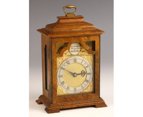 A small walnut cased mantel timepiece, by Charles Frodsham, London, with an eight-day duration movement, the break-arch brass