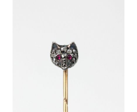 A 19th century diamond fox mask stick pin, decorated in rose cut diamonds with red stone set eyes, indistinctly stamped to re