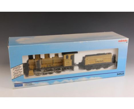 A Marklin 1:32 scale 0-6-0 tank engine and tender, 'Ludwig K.Bay.Sts.B', model no. 54523, the locomotive 27cm long, the tende
