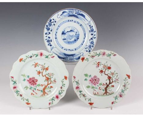 A pair of Chinese famille rose export porcelain plates, Qianlong period, each painted and gilt with a central peony and fruit