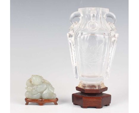 A Chinese rock crystal vase, late Qing dynasty, of hexagonal tapering form, engraved with a flower spray, the flared narrow n