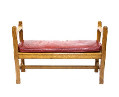 Late 19th century oak hall bench with associated red leather cushion, h72cm w107cm d39cm 