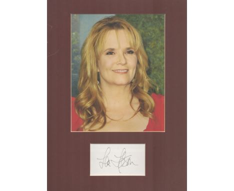 Actor, Lea Thompson mounted signature piece, overall size 16x12. This beautiful item features a colour photo and a signed whi
