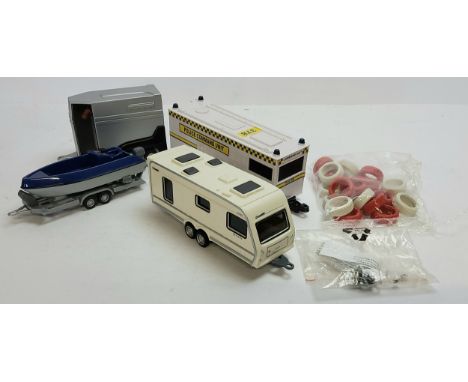 A Scalextric compatible track caravan, Police Command Unit, trailer &amp; boat and horse box with model horse; bag of tow hoo
