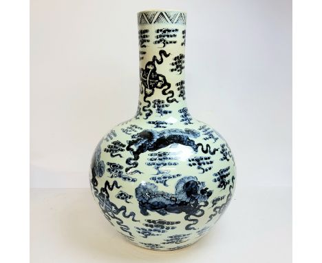 A very large and impressive Chinese temple vase decorated with an all-over, underglaze blue and white design of Dogs of Foo o