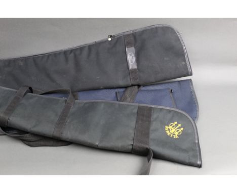 Three shotgun slips, length +/- 127 cm, Beretta and Charles R Sykes of Penrith.