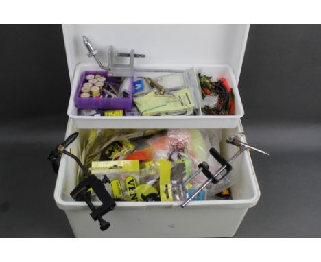 A box of fly tying vices, tools and materials, to include furs, feathers etc.