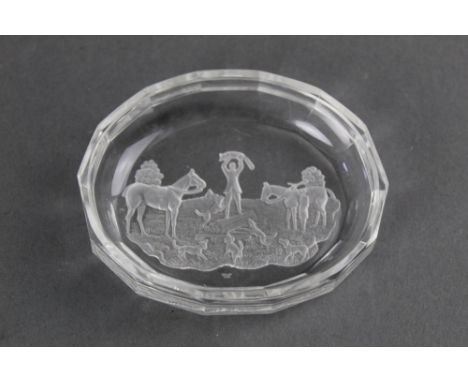 A pin dish with fox hunting scene to the base, 9 x 7.5 cm.