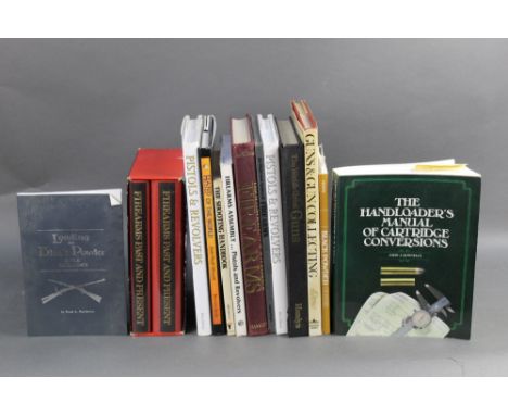 Fourteen books on guns, to include "The Hand Loaders Manual of Cartridge Conversions" by John J Donnolly and "Loading The Bla