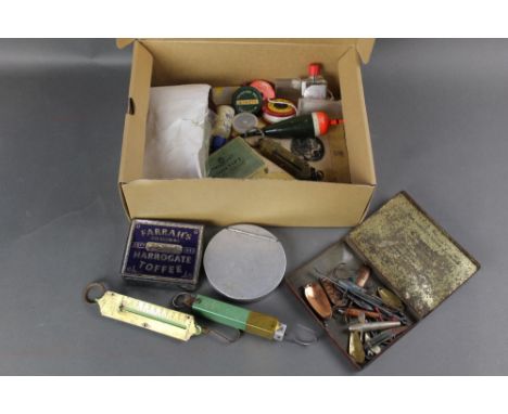 Box lot containing vintage spoons, to include GP Graham &amp; Son of Cockermouth, various weighing scales, floats etc.