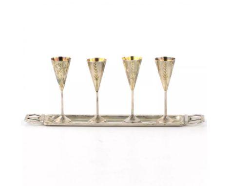 Silver Cognac set in Art Deco Style of 4 glasses with a tray, work of Ivan Khlebnikov. An elongated, rectangular-shaped tray 