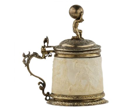 Beer cup, the holy Grail, in hammered silver with gilding, with Atlas on the hinged lid and carved religious scenes on a sing