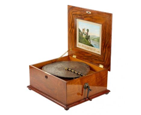 Polyphon, walnut disc music box from the late 19th century. With opening, inlaid lid, clockwork mechanism and steel comb. Dim