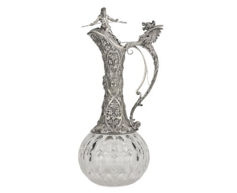 Magnificent crystal wine jug from the second half of the 19th century. The silver upper part of the decanter is decorated wit