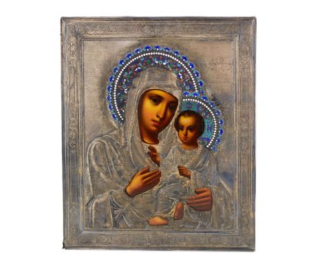 Icon of the Tikhvin Blessed Virgin Mary in a silver frame and crowns of cloisonne enamel. The turn of the 19th-20th centuries