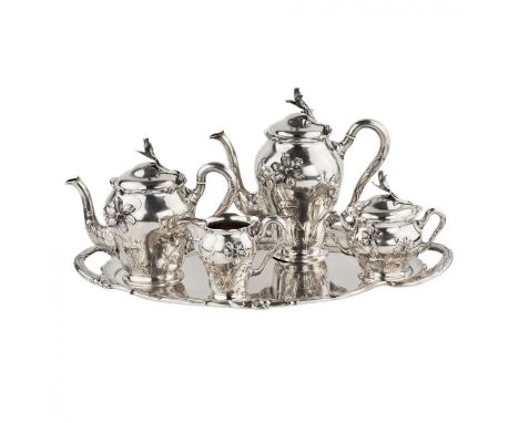 Poetic Art Nouveau silver tea and coffee set by Bruckmann, on the original tray. The silver set includes a large teapot with 