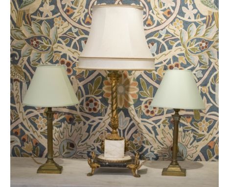 LAMP, Empire style Corinthian column with spiral twist column on marble base with a pair of brass reeded column lamps. (3) (w