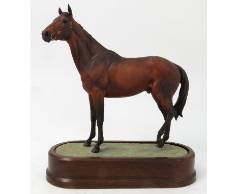 A Royal Worcester limited edition model, of Mill Reef, modelled by Doris Lindner, with plinth and certificate
