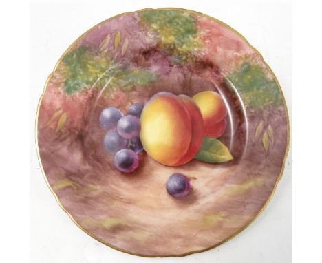 A Royal Worcester side plate, decorated with hand painted fruit, by Maybury, to a shaped gilded edge, circa 1954, diameter 6.