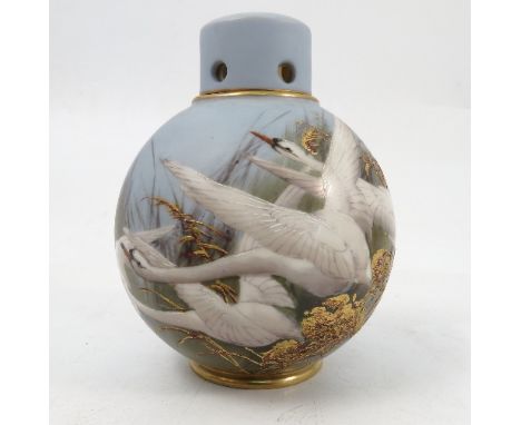 A Royal Worcester globular covered pot pourri, decorated with swans to a powder blue ground, by C H C Baldwyn, shape number 2