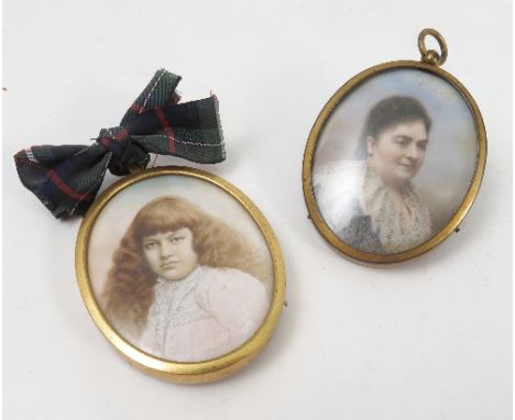 Two 19th century oval portrait miniatures, painted on ivory, of a young girl and other lady, maximum diameter 2.25ins, in gil