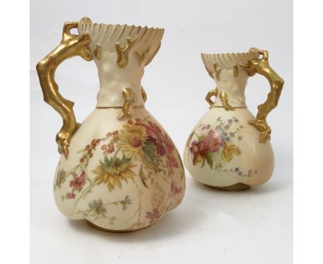 A pair of Royal Worcester blush ivory quarter lobed coral jugs, decorated with flowers, shape number 1507, circa 1903, height