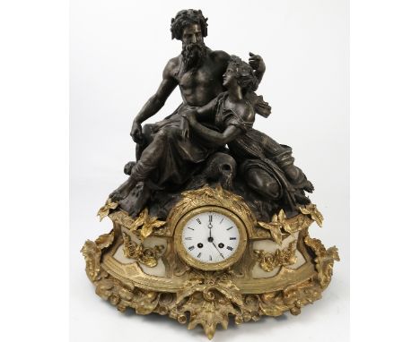 A 19th century gilt metal and spelter mantel clock, the striking movement stamped Hatton Paris 14672, the white enamel dial s