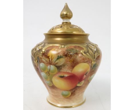 A Royal Worcester quarter lobed covered vase, decorated half round with hand painted fruit, by Roberts, shape number H279, co