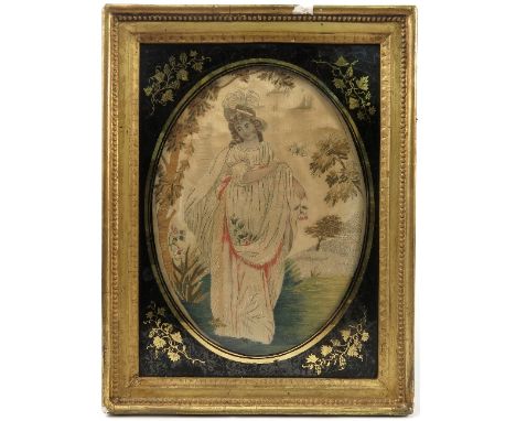 A pair of 19th century oval tapestry pictures, on silk, of ladies in landscape, with black and gilt decoration to the glass, 