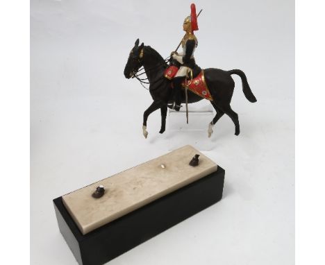 A Royal Worcester model, Royal Horse Guards (The Blues), modelled by Doris Lindner, dated 1961, af, with plinth 
