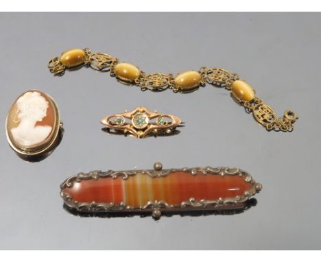 A Victorian agate panel brooch, together with a tiger eye set bracelet, and other jewellery items 