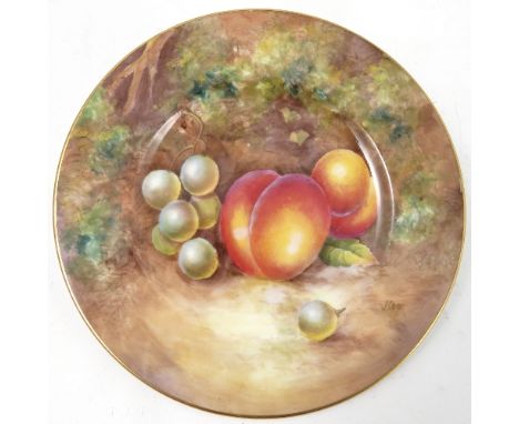A Royal Worcester plate, decorated with hand painted fruit, by Cook, diameter 6ins 