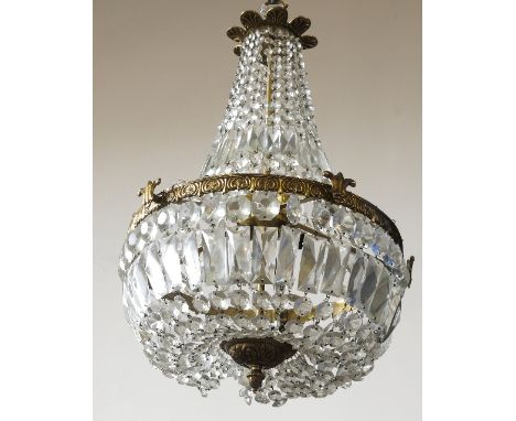 A modern multi light fitting, with faceted glass droppers of various sizes, to a brass ring with further droppers below, heig