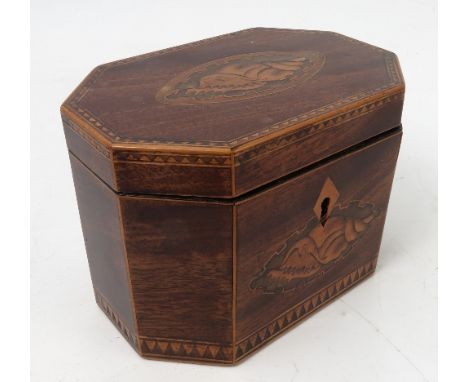 A 19th century mahogany tea caddy, of octagonal form, with shell inlay to the top and front with triangular inlaid bands to t