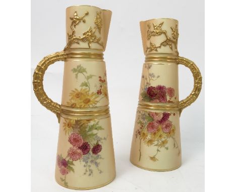 A pair of Royal Worcester blush ivory claret jugs, decorated with flowers, shape number 1047, circa 1900, height 9ins