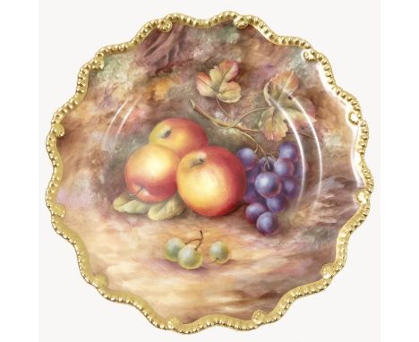 A Royal Worcester cabinet plate, decorated with hand painted fruit, by Price, to a shaped gilded gadrooned border, circa 1950