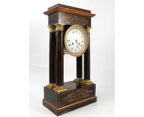 A 19th century French striking mantel clock, of architectural design, with inlaid decoration to the rectangular top, columns 