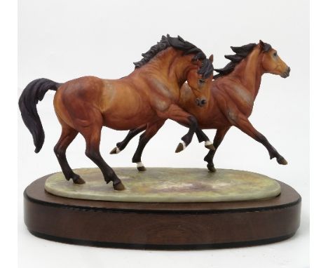 A Royal Worcester limited edition model, of Galloping Ponies, modelled by Doris Lindner, with plinth and certificate
