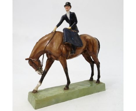 A Royal Worcester model, At the Meet, modelled by Doris Lindner, model number 3114, dated 1936, af
