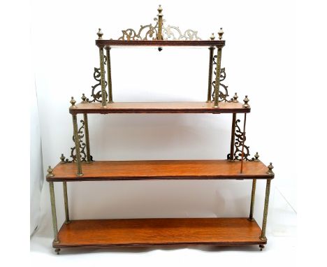 Antique oak wall shelf with gilt brass mounts, some missing. 76cm wide x 15cm deep x 85cm high. 