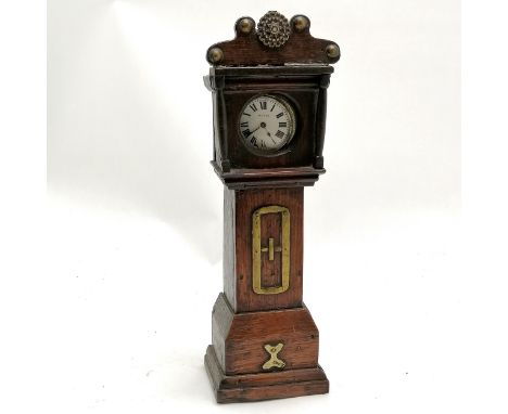 Antique oak pocket watch stand as a grandfather clock with brass decertations and a Secton pocket watch. 31cm high x 7cm deep