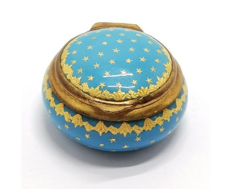Antique blue enamelled patch box with gilt metal mounts with gold star detail 3cm diameter- light abrasions and slight loss t