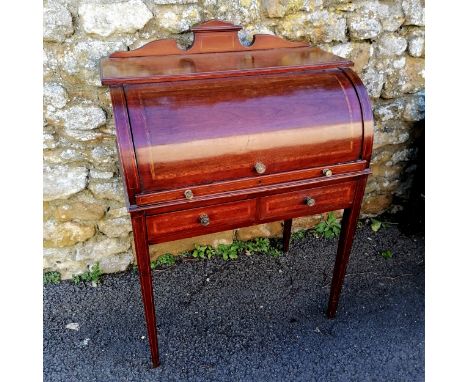 Antique mahogany barrel fronted ladies desk. 75cm x 45cm x 104cm, some scratches to surface and small split to the interior o