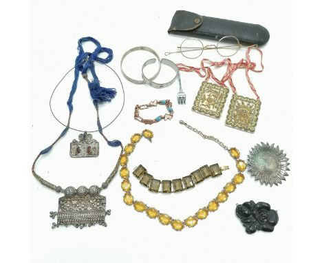 2 unmarked silver ethnic necklaces, Scottish hand worked cuff bangle, antique spectacles etc. 