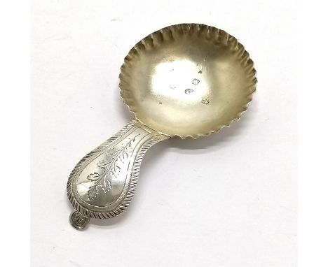 Victorian silver hallmarked caddy spoon Chester 1856 crimped rim to gilded bowl and leaf decoration to the handle 8cm long 10
