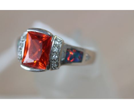 Silver red stone and opal ring