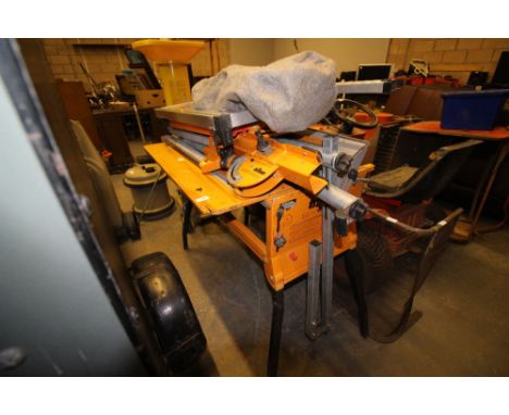 Triton 2000 Saw Bench with 8" Circular Saw accessories including: Biscuiter, Router Table, Multiangle Cutting Guide, Normal G